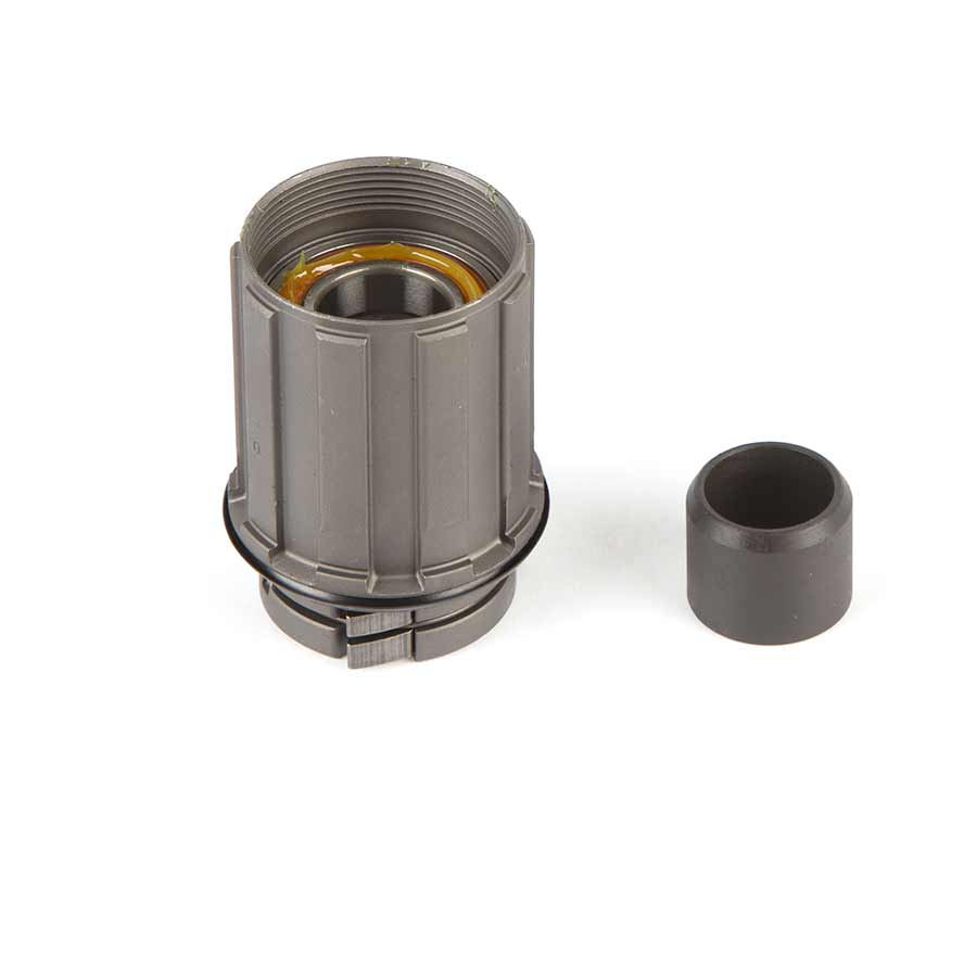 SRAM X9 freehub body, a durable hub part for mountain bike wheels, shown in close-up on a white background.