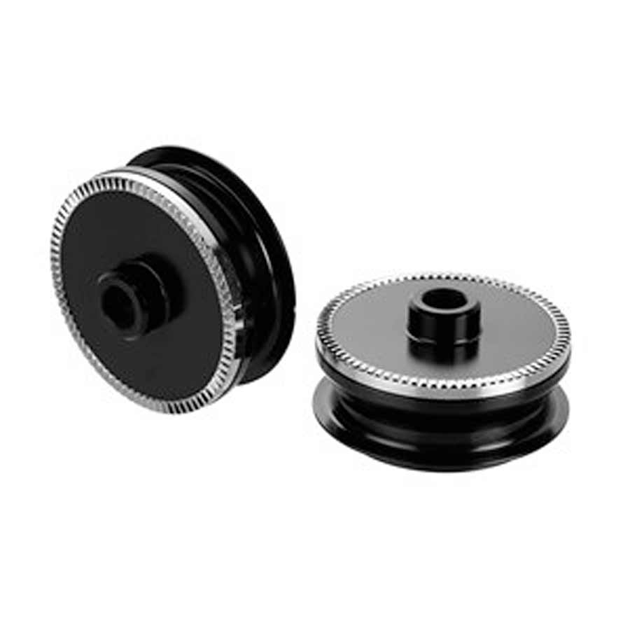 SRAM Conversion Caps Hub part showing black metal caps with branding, designed for bicycle hub replacement and maintenance.