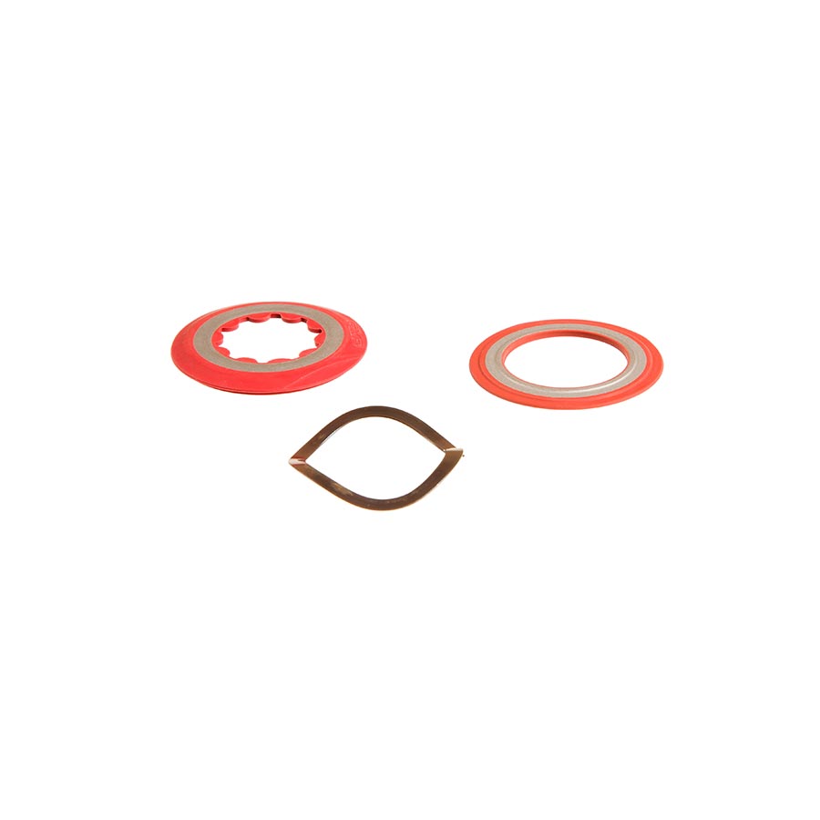 SRAM Specialized GXP Shield and Washer, bottom bracket parts, close-up of metal shield and washer for bike GXP cranksets.