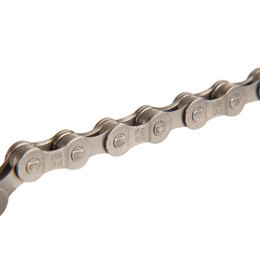 SRAM PC-951 chain for bikes, showing a close-up of the durable bicycle chain with metal links and brand markings.