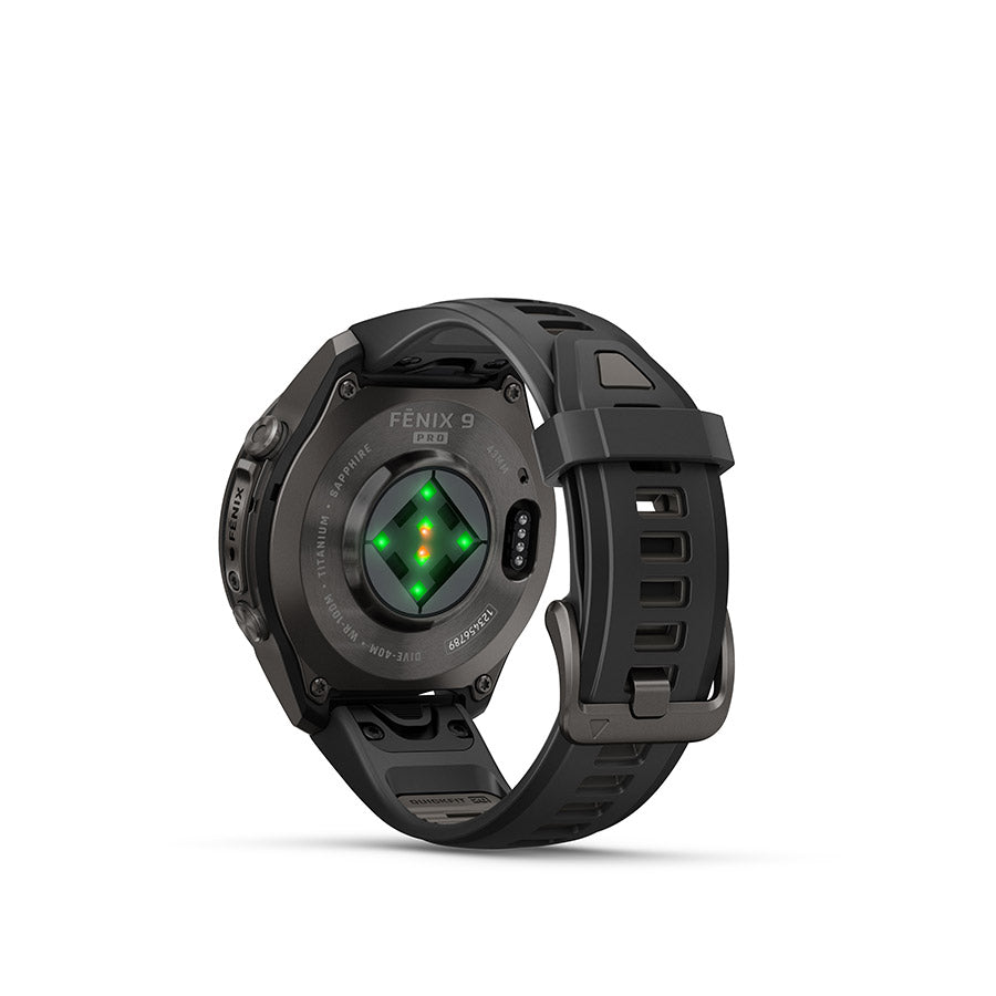 Garmin Fenix 9 Pro 43mm cycling computer with GPS display and outdoor watch features, shown on a mount.