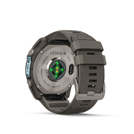 Garmin Fenix 9 51mm cycling computer with GPS display and outdoor functionality, shown on a wrist with cycling gear.