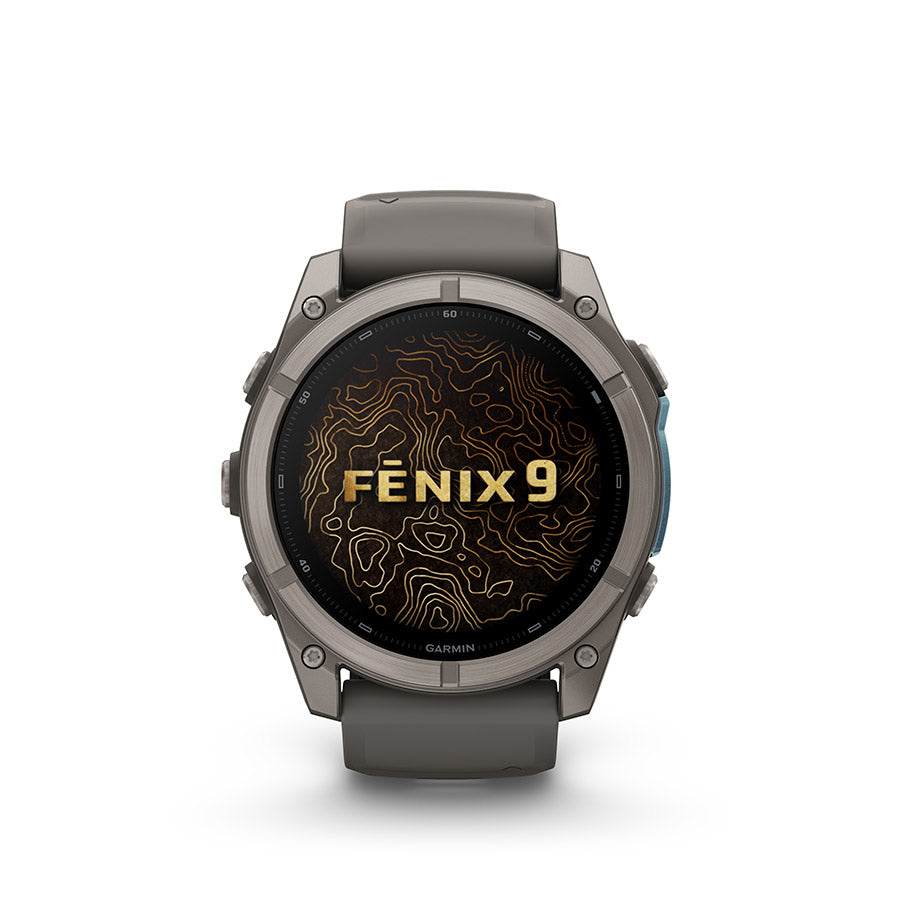 Garmin Fenix 9 51mm cycling computer with GPS and fitness tracking display, showing a colorful interface on a watch face.