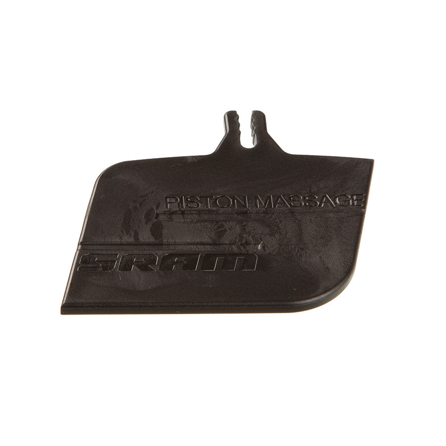 SRAM Piston Massage Spacer for brake tools, shown in use, helps maintain brake caliper pistons during service or maintenance.