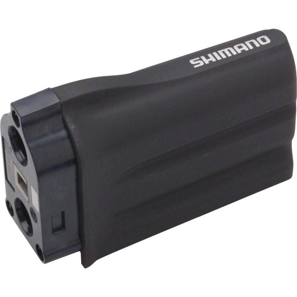 Shimano Di2 battery for electronic shifters, compact and rechargeable, shown in a close-up image.