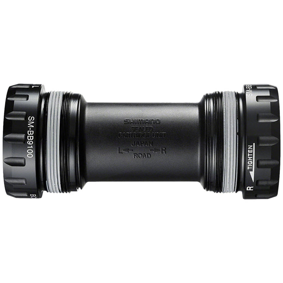 Shimano Dura-Ace BB92 BB9000 Hollowtech II bottom bracket showing the cylindrical metal components and spindle for road bike compatibility.