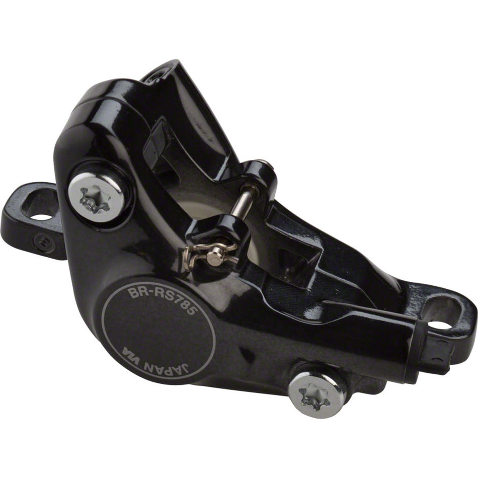 Shimano BR-RS785 disc brake caliper for mountain bikes, shown in black with mounting hardware and hydraulic brake pistons.