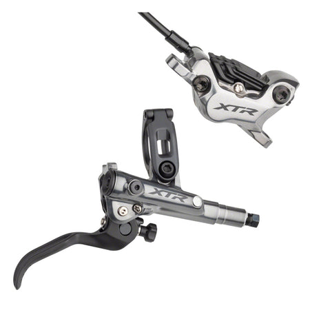 Shimano XTR M9120 disc brake with black caliper and rotor for mountain bikes, mounted on a bike wheel.