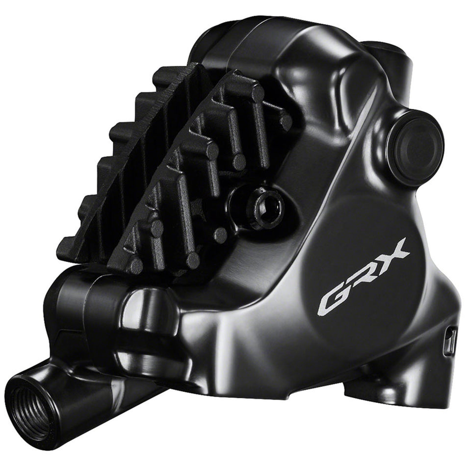 Shimano GRX BR-RX820 2-piston disc brake caliper for gravel bikes, showcasing its compact design and high-performance braking system.