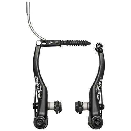 Shimano Deore BR-T610 linear pull rim brakes mounted on a bicycle wheel, showcasing their sleek black design and cable mechanism.