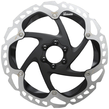 Shimano RT-MT905 disc brake rotor showing detailed metal rotor with ventilation holes and mounting edges for mountain bike braking.
