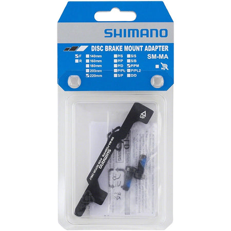 Shimano disc brake adapter for bicycle brake system, shown in the image, part number BR1704-02, used for mounting brakes.