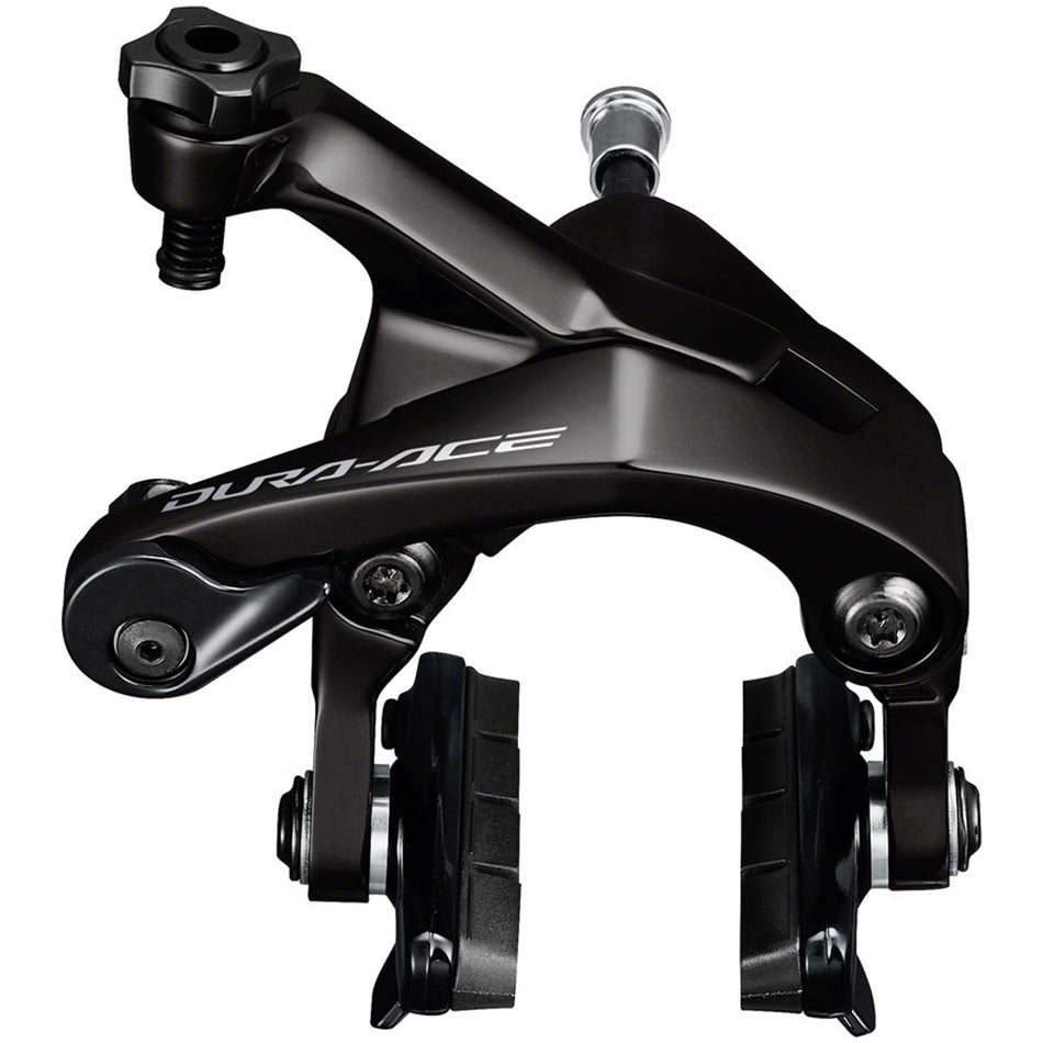 Shimano Dura-Ace BR-9200 road rim caliper brake mounted on bike wheel, showcasing sleek silver finish and precise brake pads.