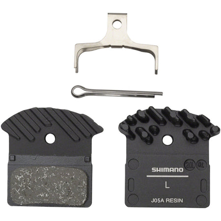 Shimano J05A-RF disc brake pads for bicycle, showing the brake pad set with metal backing and friction material.