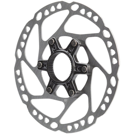 Shimano SM-RT64 disc brake rotor showing vented steel surface and mounting holes for mountain bike braking system.