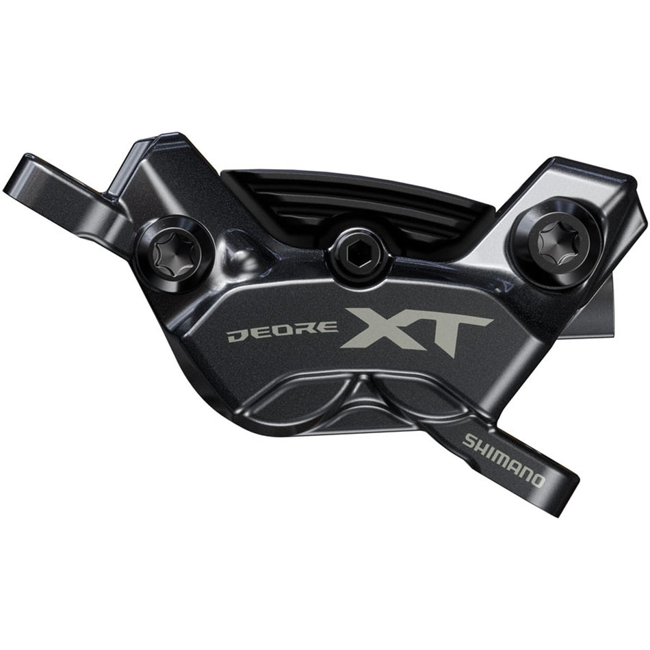 Shimano Deore XT BR-M8220 Enduro disc brake caliper mounted on a mountain bike for powerful stopping performance.
