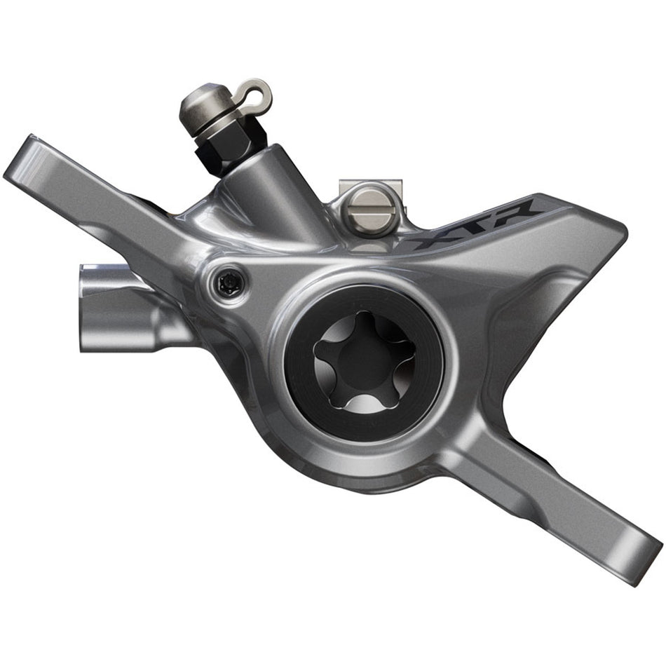Shimano XTR BR-M9200 XC disc brake caliper with mounting hardware, showcasing the high-performance bicycle disc brake component.
