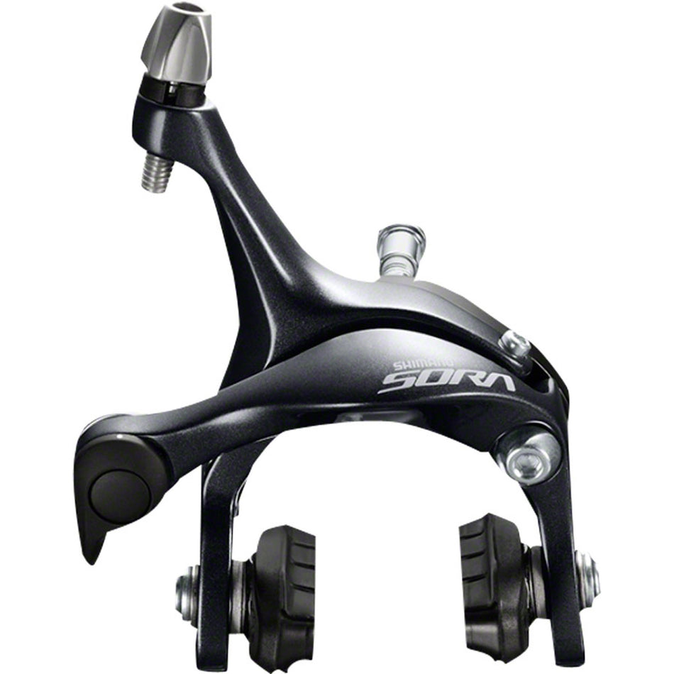 Shimano Sora BR-R3000 brake caliper mounted on bicycle, showing its design and mounting hardware for road bike braking system.