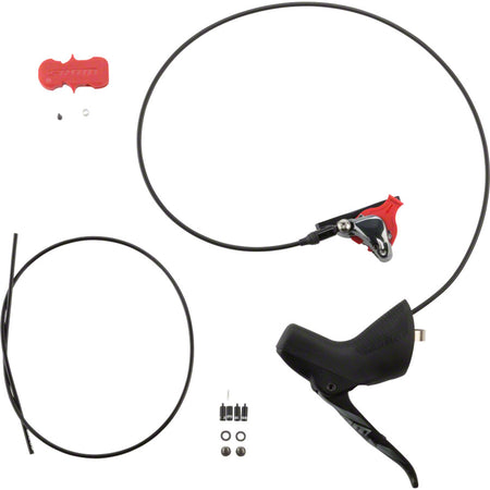 SRAM Force 1 hydraulic disc brake with black caliper and rotor, mounted on a bicycle wheel for stopping power.
