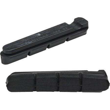 Shimano replacement brake pads for road bike brake shoes, shown in the image with multiple pad sets and hardware for easy installation.