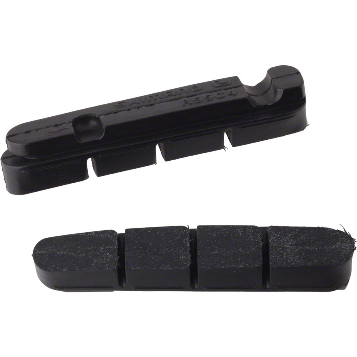 Shimano replacement brake pads for road bike brake shoes, shown in a close-up image with detailed pad surfaces.