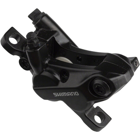 Shimano BR-MT520 brake calipers with black finish and mounting hardware for mountain bike braking systems.