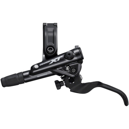 Shimano Deore XT M8100 disc brake with black caliper and rotor, mounted on a mountain bike wheel for reliable stopping power.