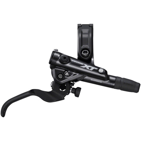 Shimano Deore XT M8100 disc brake with black caliper and rotor, mounted on a mountain bike wheel.