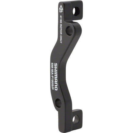Shimano disc brake adapter for bike brake system, compatible with various brake calipers and rotors.
