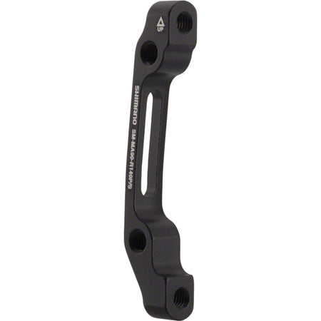 Shimano disc brake adapter for bike brake system, showing metal mounting bracket and attachment points.