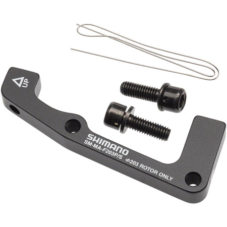 Shimano disc brake adapter for bicycle brake system, compatible with various brake parts and accessories.