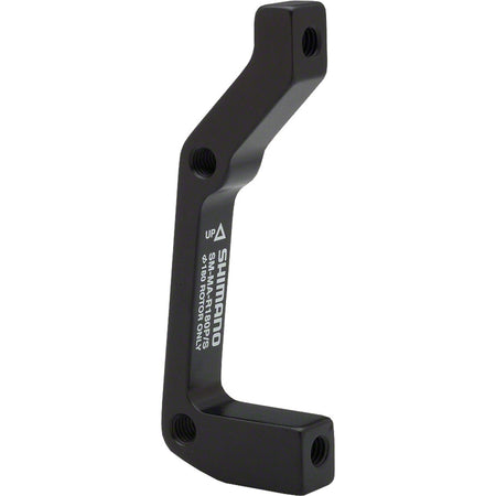 Shimano disc brake adapter for bicycle brake system, mounting component for brake calipers and rotors.