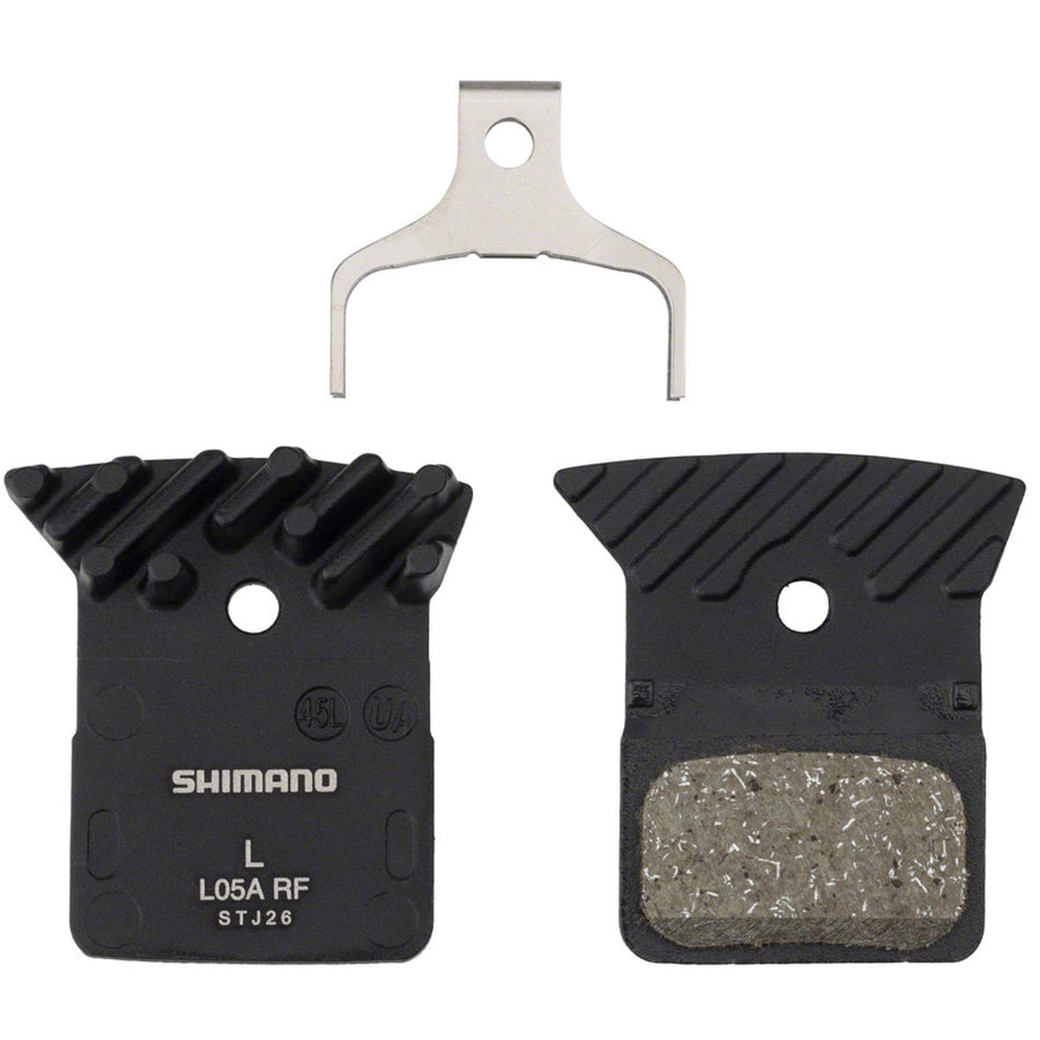 Shimano L05A-RF disc brake pads for mountain bikes, showing the brake pad set with detailed friction material and mounting hardware.