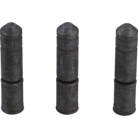 Shimano chain links and pins for bicycle chains, close-up of metal chain components on a plain background.