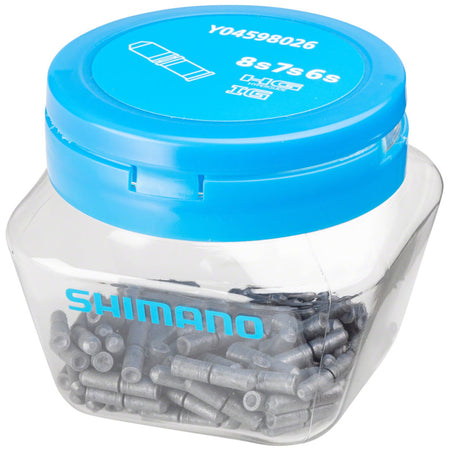 Shimano chain links and pins for bicycle chains, close-up of metal components with detailed pin and link connections.