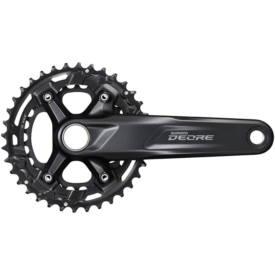 Shimano Deore M4100 crankset with black crank arms and chainring, mounted on a bike, showcasing durable mountain biking components.