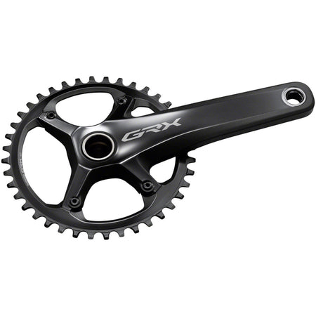Shimano GRX FC-RX810 crankset with double chainrings and black finish, mounted on a bike drivetrain.