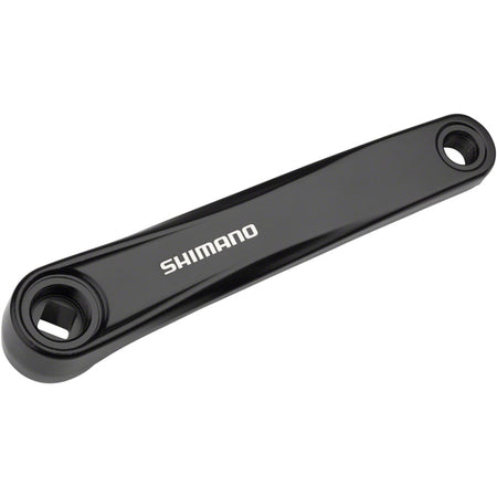 Shimano FC-MT101 left crank arm for mountain bike cranksets, shown in black with textured pedal attachment area.