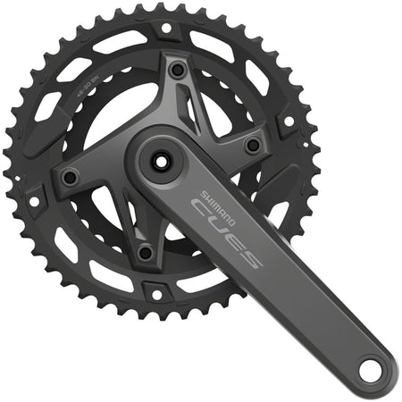 Shimano CUES FC-U6000-2 crankset with double chainrings and crank arms for road bikes, shown in a close-up image.