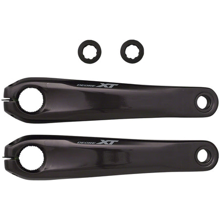Shimano XT FC-M8150 e-MTB crankset for e-bike drivetrain, showing the black crank arms and chainring on a mountain bike.