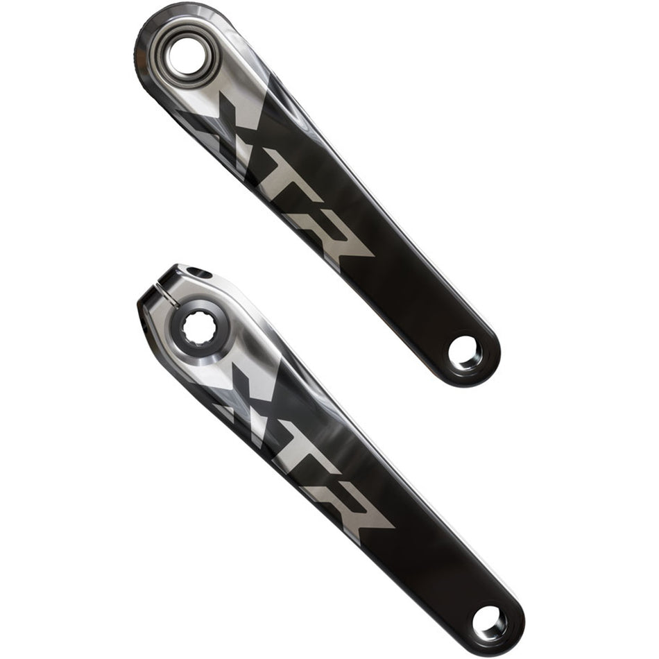 Shimano XTR FC-M9220 Enduro crankset with black crank arms and chainring for mountain biking, close-up of drivetrain component