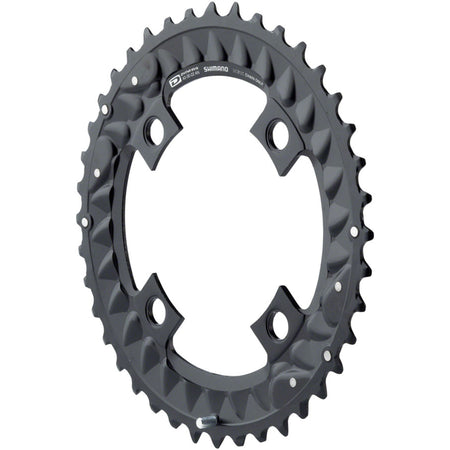 Shimano Deore M6000 10-speed chainring with black finish, featuring bolt holes and gear teeth for mountain bike crankset.