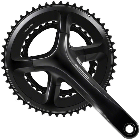 Shimano 105 FC-RS520 crankset with double chainrings and crank arms, suitable for road bikes, shown in the image.