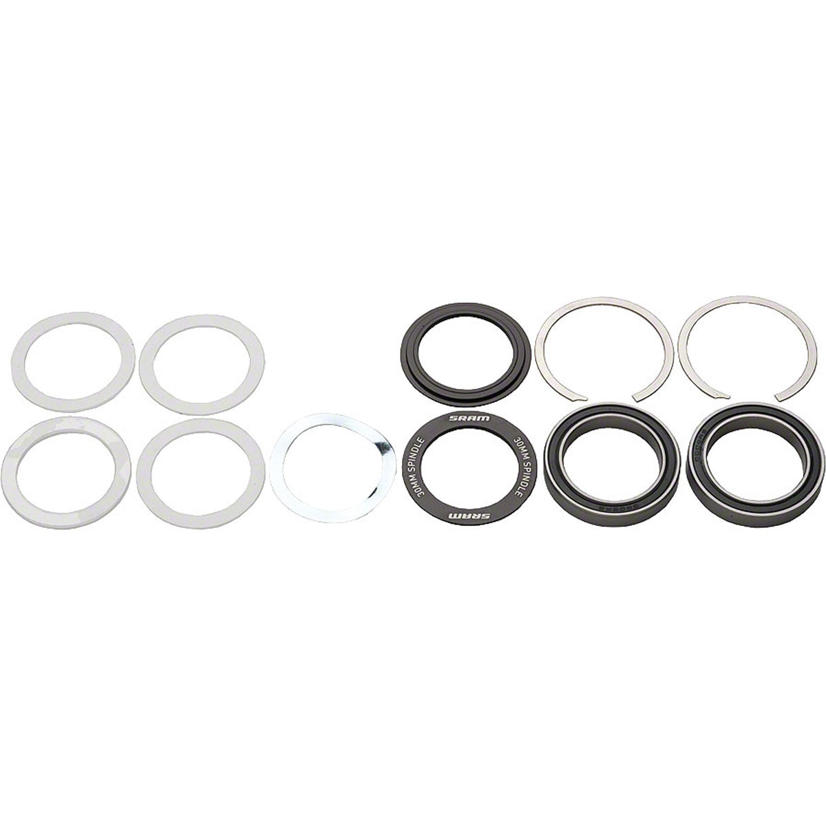 Black SRAM non-threaded bottom bracket installed on a bicycle crankset, showing the smooth, durable design for bike maintenance.