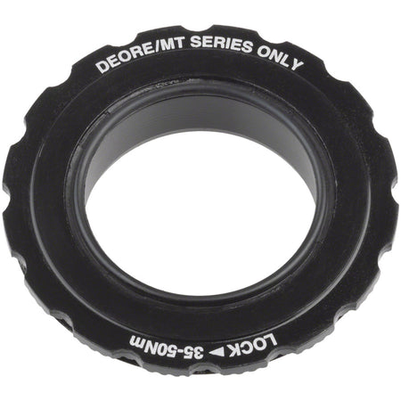 Shimano direct mount lockring for cranksets, shown in the image, used to secure the crank component assembly.