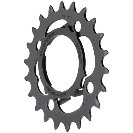 Shimano Alivio FC-M4000 chainrings and spider set for mountain bike crankset, black metal cycling components.