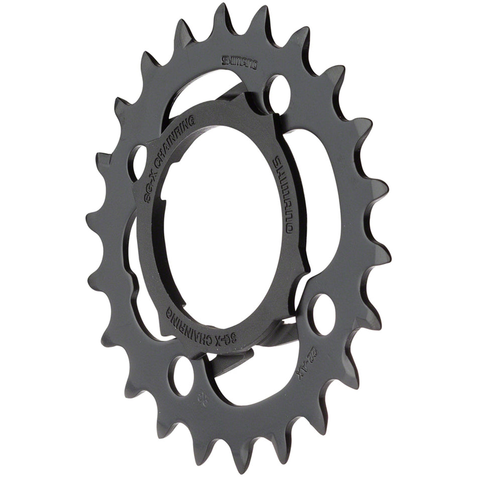 Shimano Alivio FC-M4000 chainrings and spider set for mountain bike crankset, black metal cycling components.