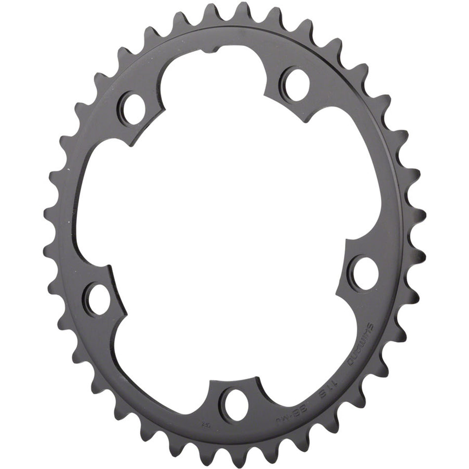 Shimano RS500 11-speed chainrings and spider set, black metal bicycle drivetrain components, detailed close-up image.