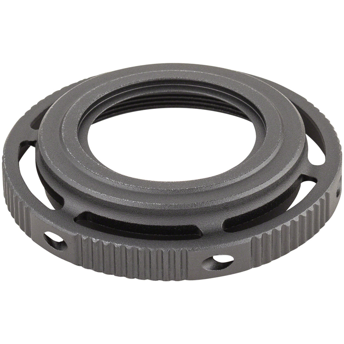 Shimano XTR FCM9100 crankset adjust nut, close-up view showing metal component used for bike crankset assembly.
