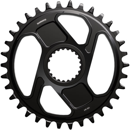 Shimano Deore XT SM-CRM86 direct mount chainring with black finish, detailed teeth design, and mounting holes for mountain bike drivetrain.
